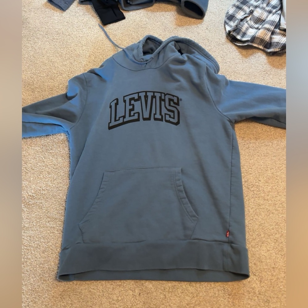 Levi’s blue hoodie.